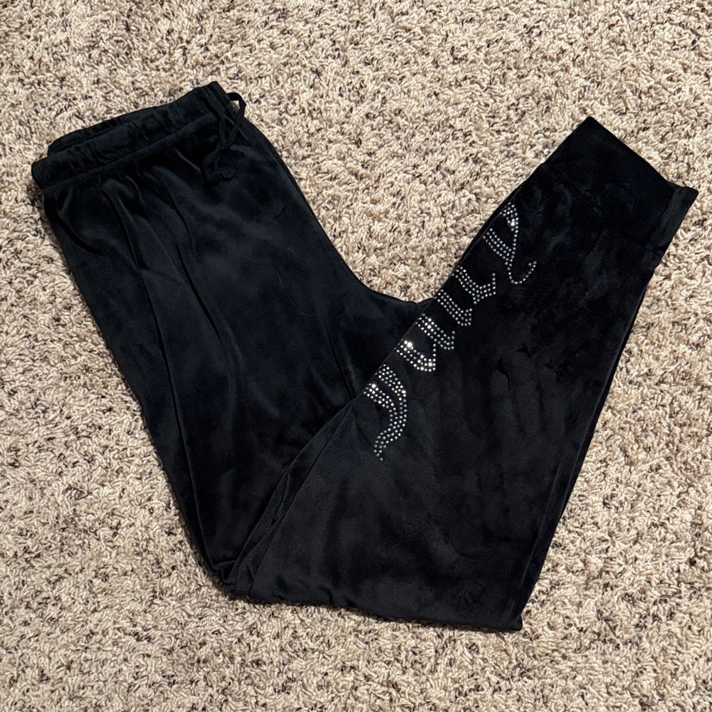 Juicy Couture size large black velour sweatpants with JUICY on one bottom side